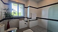 The property offers 4 spacious bathrooms