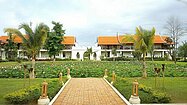 Guest-rooms seen across a lotus pond