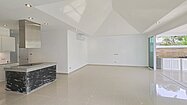 The kitchen is open-plan style