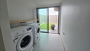 A large and equipped laundry room