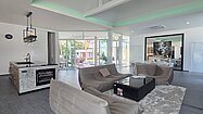 Across the living-area towards the outdoors
