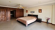 A huge bedroom with built-in wardrobes