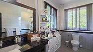 The bathrooms are chic and generous