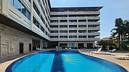The generous pool and deckchairs