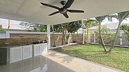 The large shaded terrace with Thai kitchen