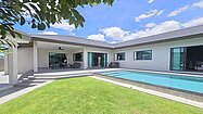 Across the lawn to the outdoor terrace