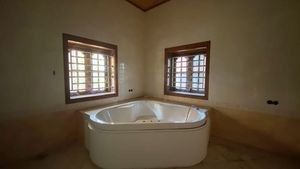 A bathroom with a Jacuzzi tub
