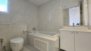 A chic bathroom with a bathtub