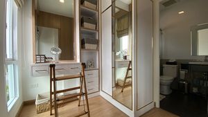 A chic walk-in wardrobe at the master-bedroom