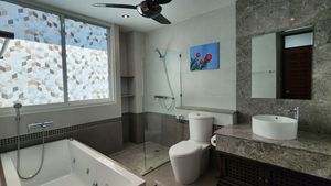 A fancy bathroom with a Jacuzzi tub