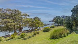 A few steps down to a secluded bathing beach