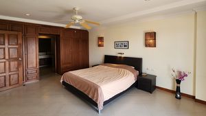 A huge bedroom with built-in wardrobes