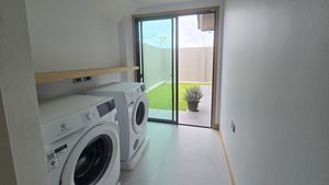 A large and equipped laundry room