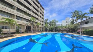 A large pool with pool bar
