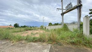 A transformer and power cables inside the plot