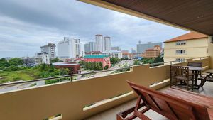 A truly large balcony with room for outdoor dining and deckchairs