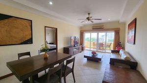 Across the living- and dining room towards the balcony