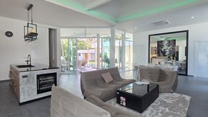 Across the living-area towards the outdoors Across the living-area towards the outdoors