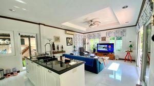 Across the living-area with the 65 Inch-TV plus surround-system