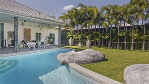 Across this lovely pool with bench