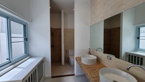 All bathrooms are light and modern
