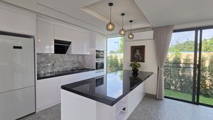 Another angle of the chic kichen and dining area