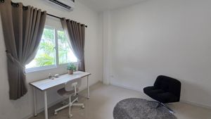 Another angle of the office room