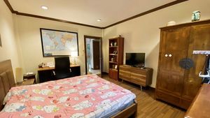 Another angle of this nicely furnished bedroom