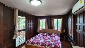 Another bedroom in the traditional Teak-wood building