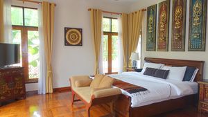 Another lavish bedroom with a view
