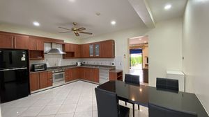 Another view of the kitchen and dining-area