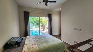 Both bedrooms offer lovely outdoor views