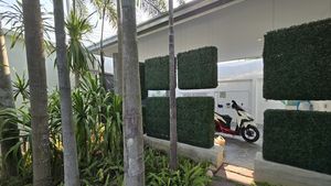 Carport with an automatic gate