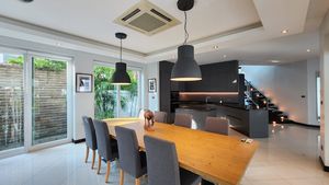 Dining for eight with the open-plan kitchen