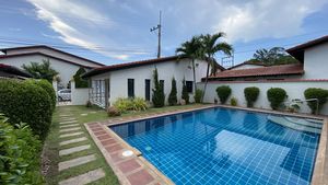 From the terrace, accross the pool to the garage