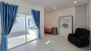 Guest house living-area and outdoor kitchen