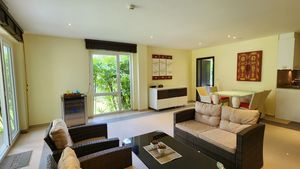 In the middle of tropical green - the living and dining area