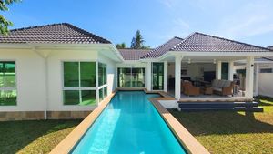 Looking over the pool to the house