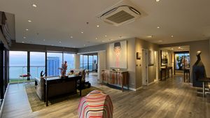 On your right, the hallway towards the bedrooms