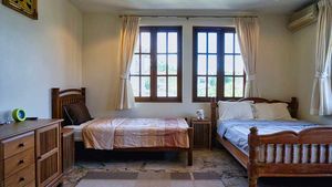 One of the smaller bedrooms