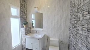 The 2 bathrooms are modern