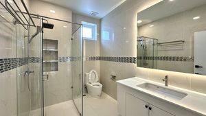 The 3 bathrooms are spacious and luxurious