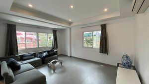 The L-shaped lounge-sofa at the living-area