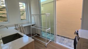 The Thai kitchen and laundry