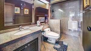 The bathrooms are all lined with granite to the ceiling