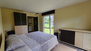 The bedroom with it`s en-suite bathroom