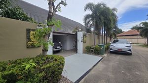 The carport holds 2 cars