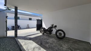 The carport with an electric gate