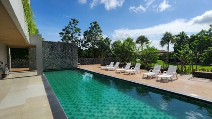 The communal pool right next to the property