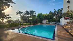 The condos pool with the beach right behind